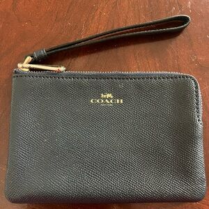 COACH Blue Leather Wristlet with Zipper Pull and Gold-tone Logo and Hardware.